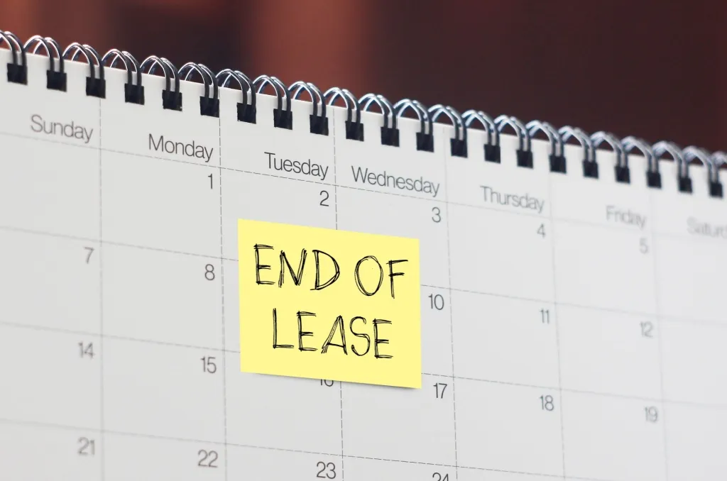Calendar with a yellow sticky note labeled 